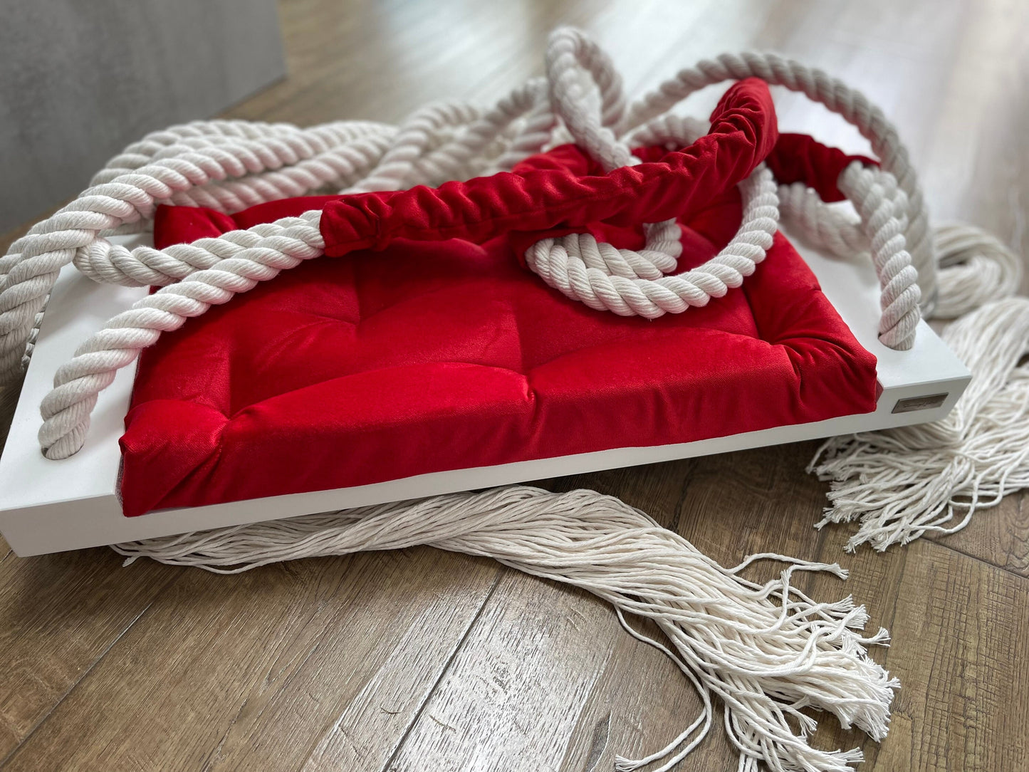 wooden white and red velvet swing seat