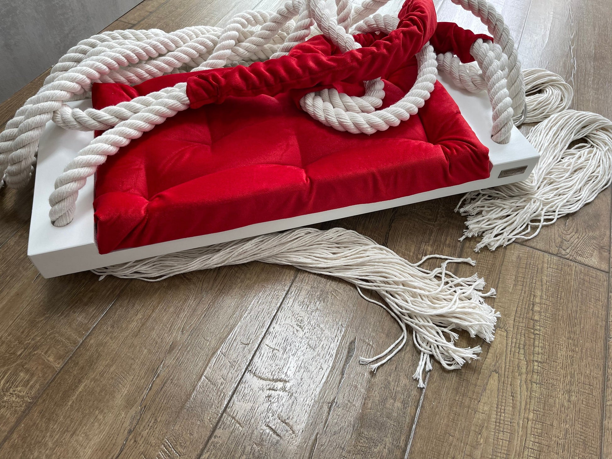 wooden indoor white and red swing